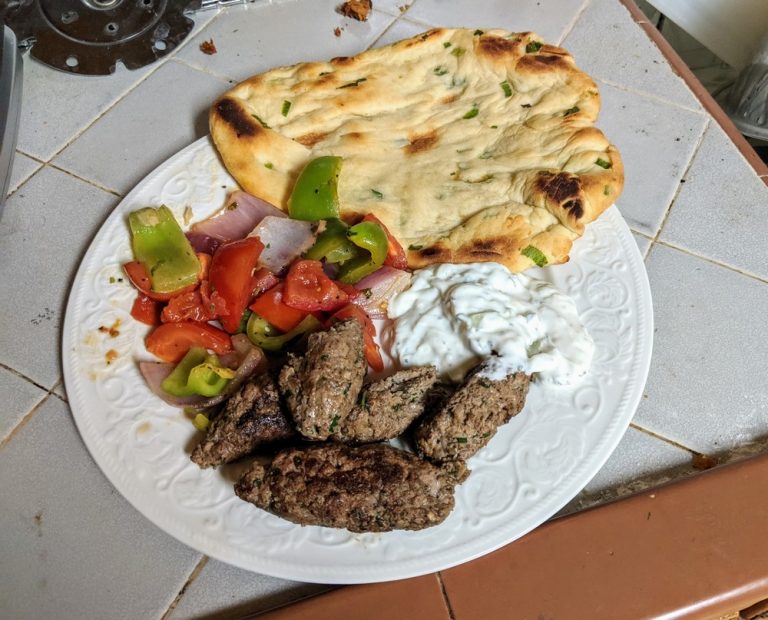 Kofta Kebabs with roasted vegetables and naan