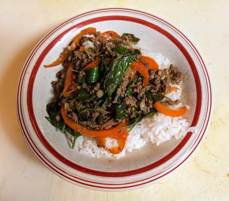 Bowl of Thai beef and basil on rice