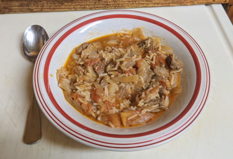 Bowl of Djibouti Skoudehkaris lamb and rice