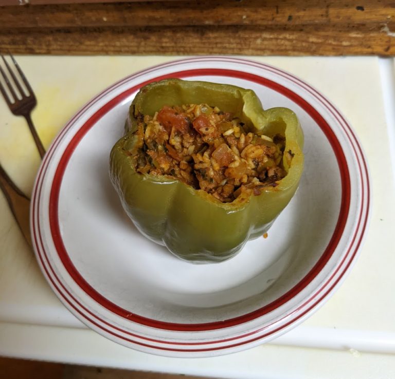 Libyan green peppers stuffed with lamb, rice, and tomatoes