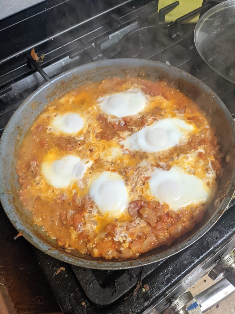 Poached eggs in tomato stew